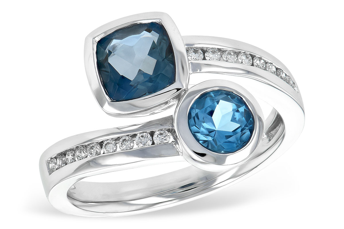 F225-72169: LDS RG 1.55 TW BLUE TOPAZ 1.70 TGW